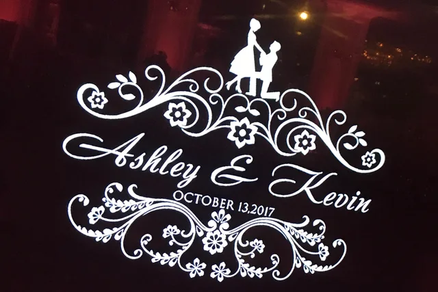 Ashley and Kevin wedding monogram projected in light