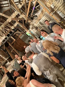 Wedding guests dancing inside the winery