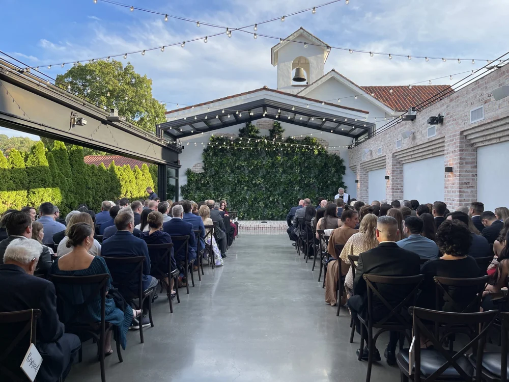 Guests gathered for the outdoor ceremony at Perona Farms